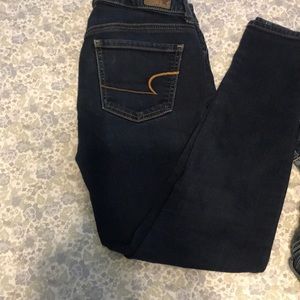 Four pairs of American eagle jeans